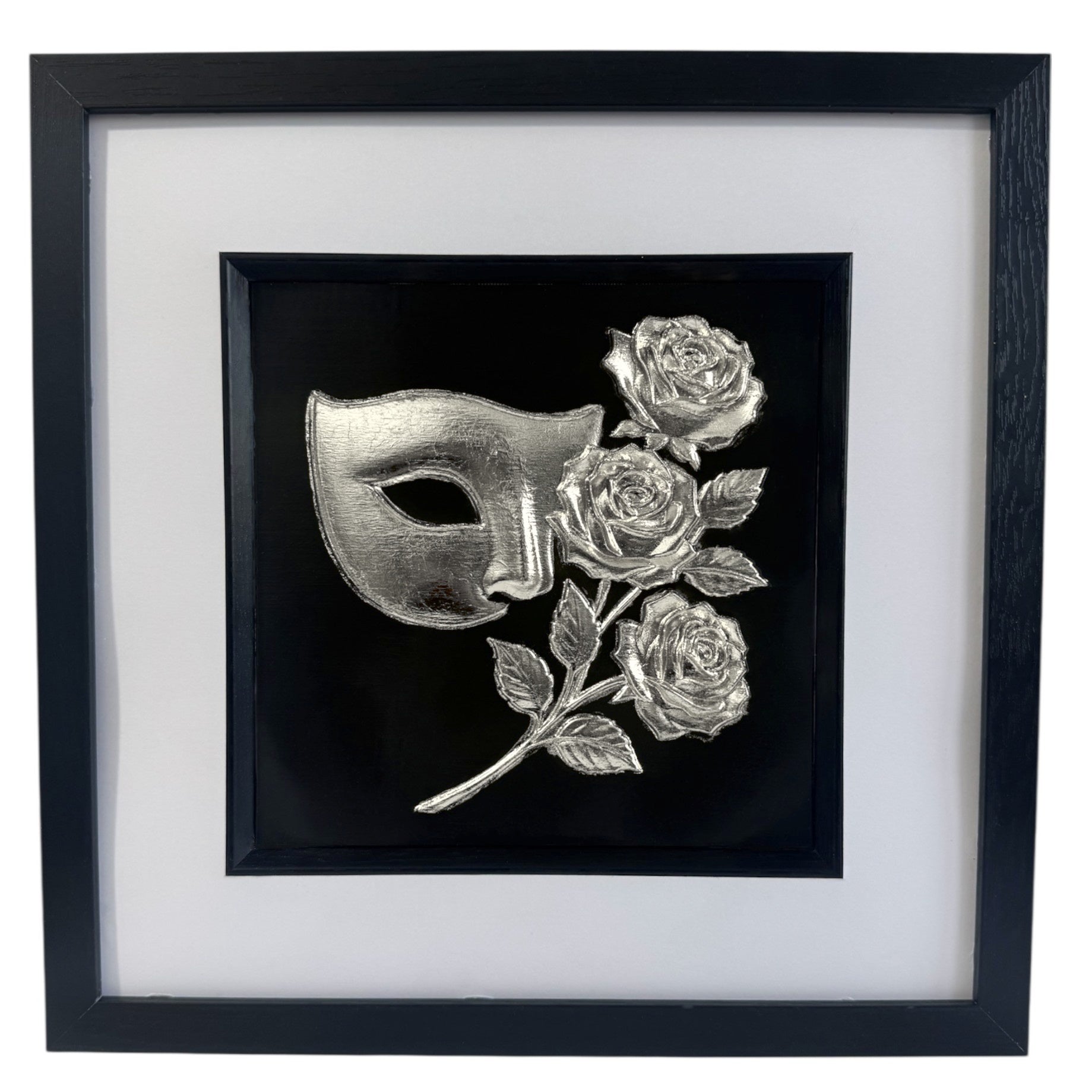 Masquerade mask and roses framed wall art in silver leaf with black wooden frame white mount and black background