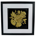 Front view of framed gold-finish floral bouquet relief with wide white mount and black box frame.