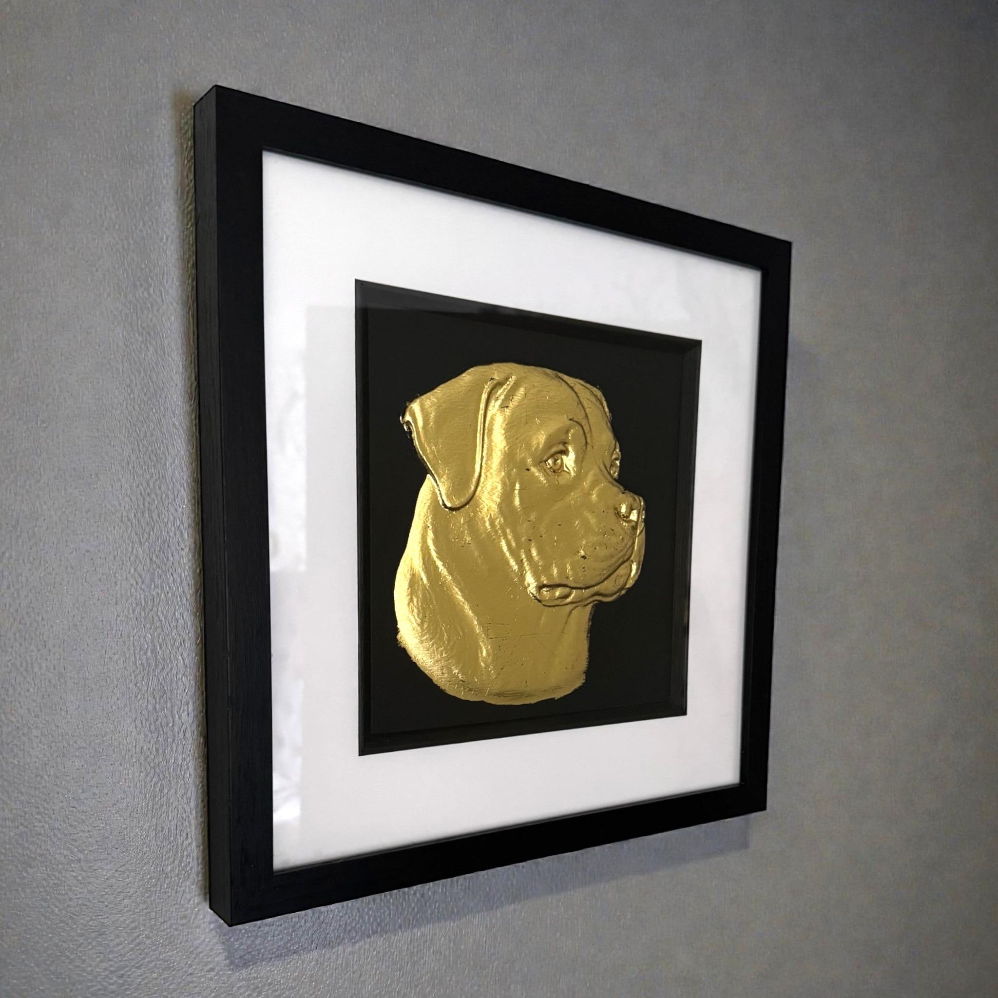 Rottweiler gold leaf framed wall art shown mounted on a wall at a slight angle with black frame and white mount