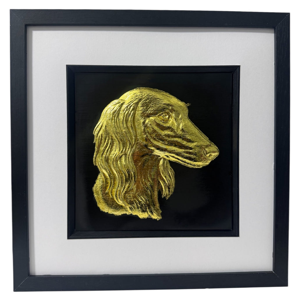 Saluki framed wall art in gold leaf shown front on with black wooden frame white mount and black background