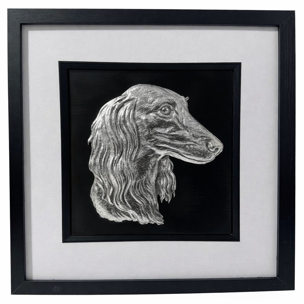 Saluki framed wall art in silver leaf shown front on with black wooden frame white mount and black background