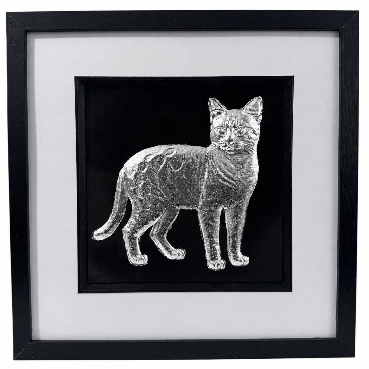 Framed Bengal cat wall art finished in realistic silver leaf, displayed on a black background with a white mount and black frame for a premium pet portrait style.