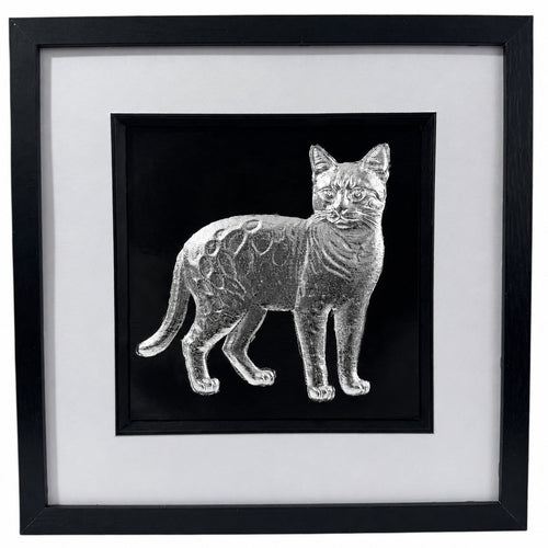 Framed Bengal cat wall art finished in realistic silver leaf, displayed on a black background with a white mount and black frame for a premium pet portrait style.