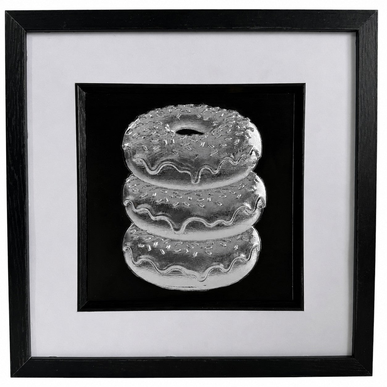 Silver doughnut stack 3D relief artwork in black frame with white mount and black centre panel.