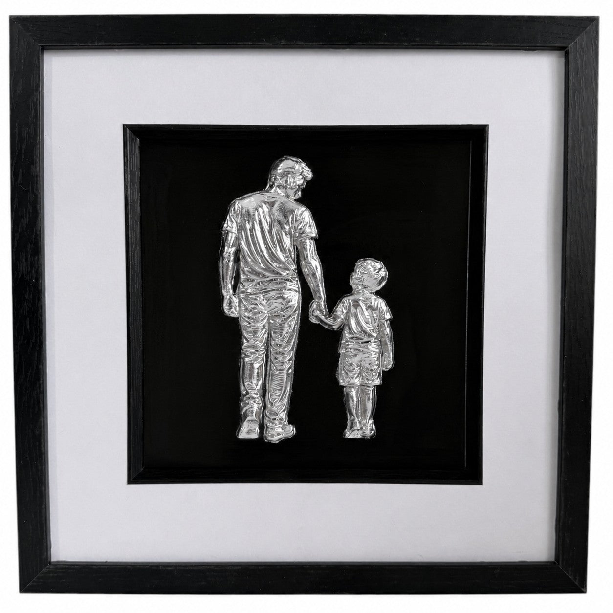 Silver father and son raised relief artwork with glass front, black centre panel and wide white mount.