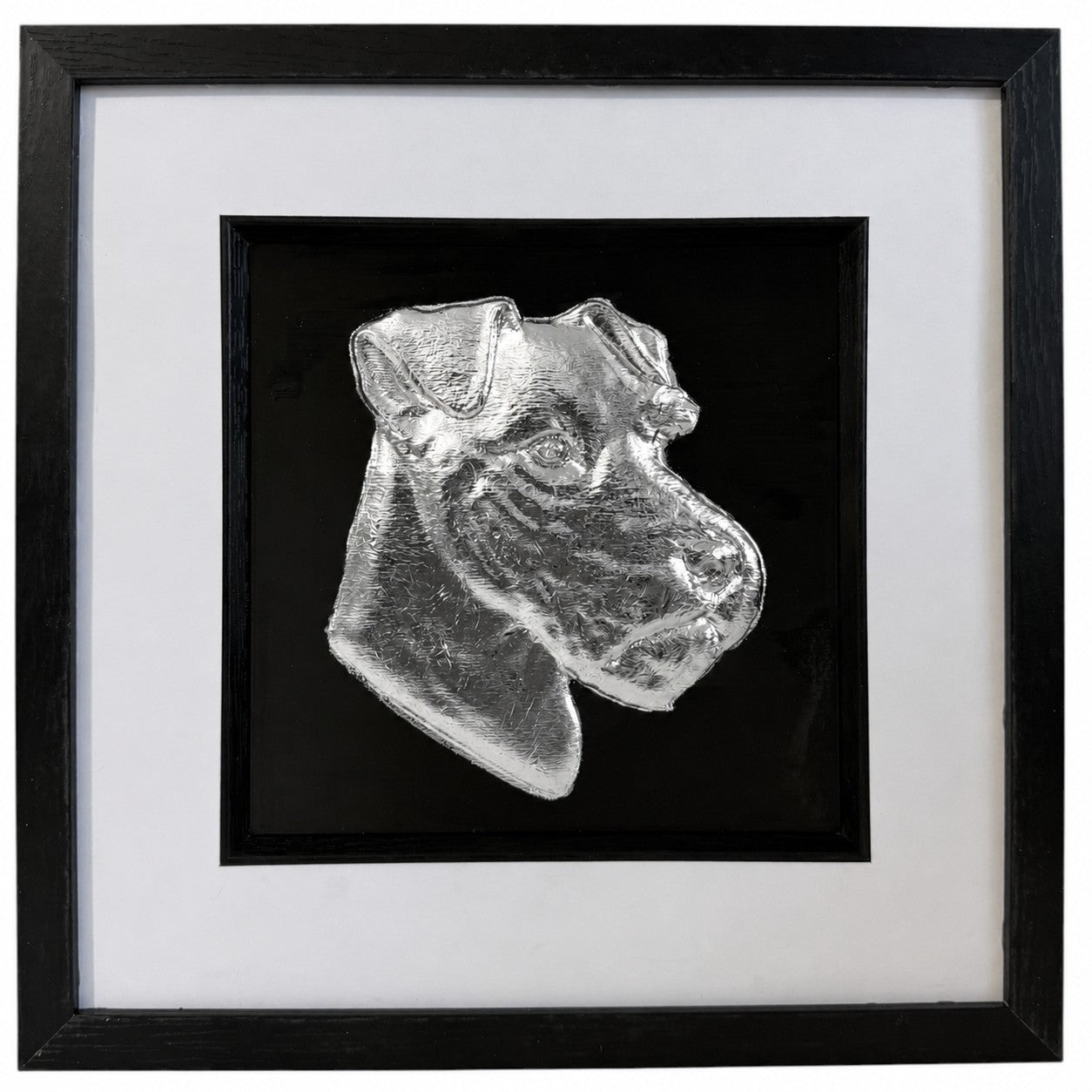 Lakeland Terrier framed wall art showing a sculpted dog portrait in silver leaf, set on a black background with white mount and black wooden frame