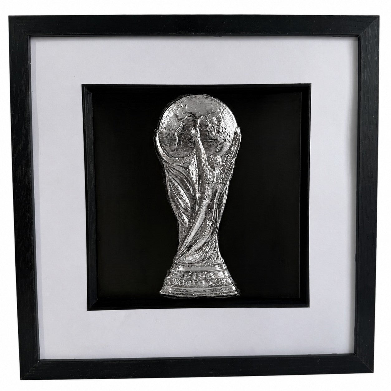 Silver World Cup trophy inspired framed football wall art with raised relief detail and white mount.