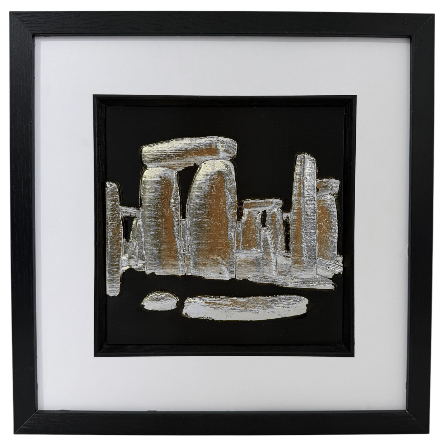 Silver Stonehenge raised relief in a black frame with white mount and black inner surround on a white background.