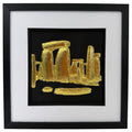 Gold Stonehenge raised relief in a black frame with white mount and black inner surround on a white background.
