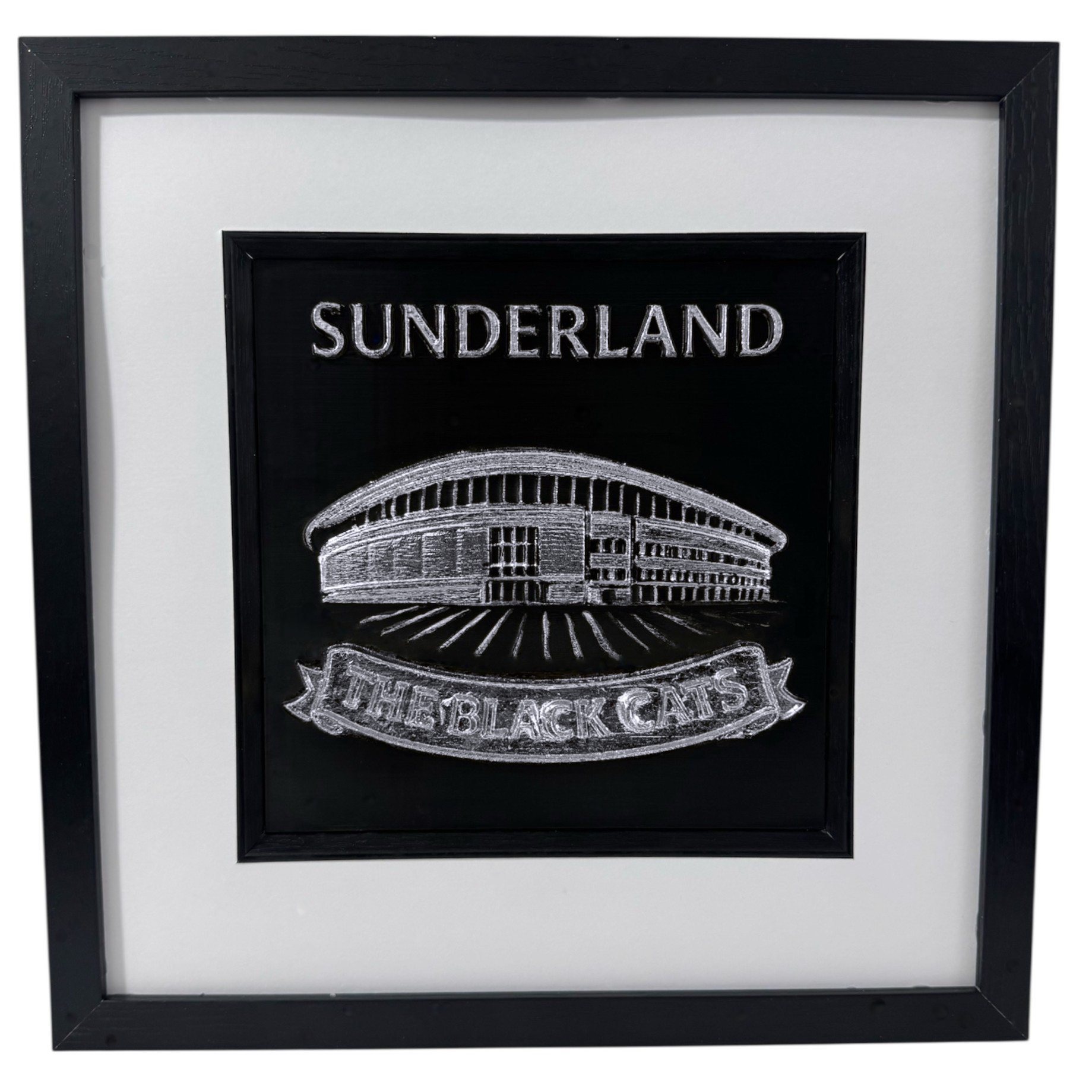 Sunderland framed wall art in silver leaf relief, square black box frame with white mount and inner black surround, front facing product photo.