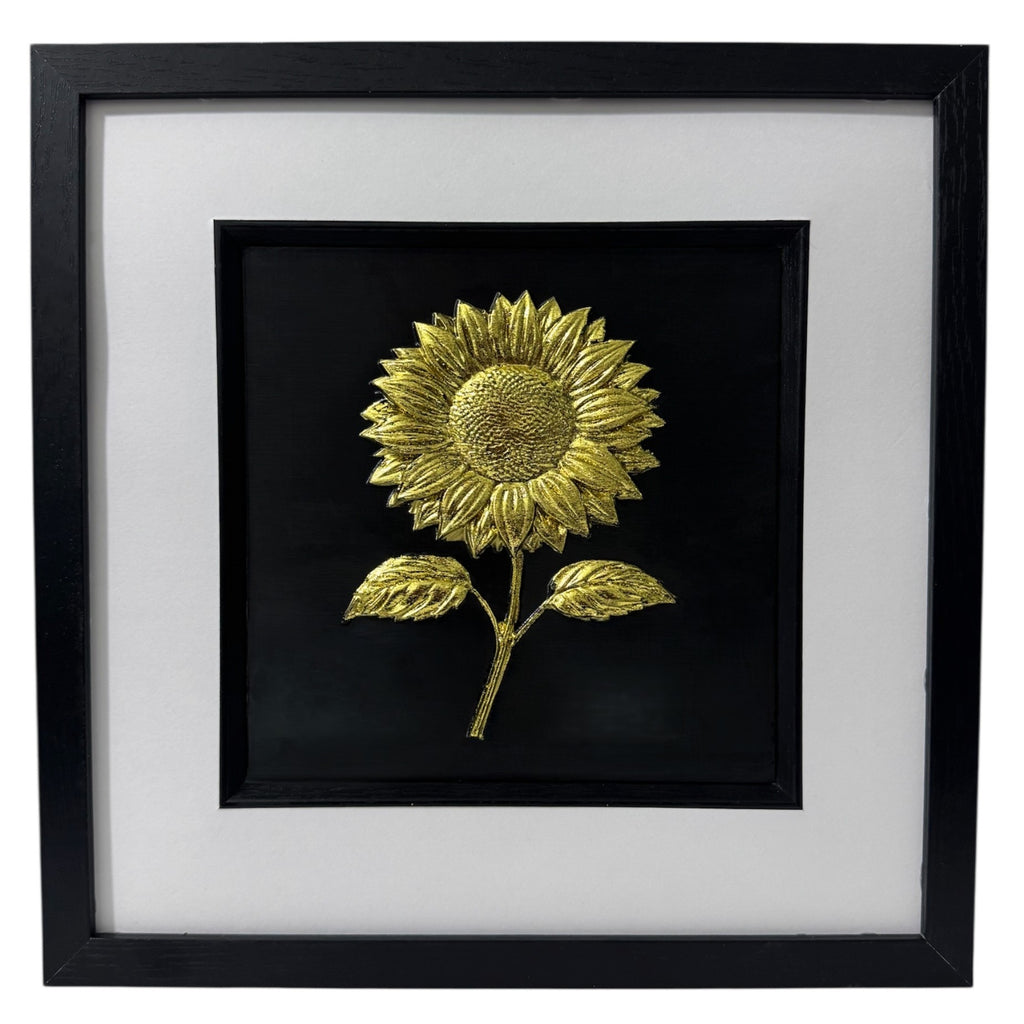 Gold Leaf sunflower 3D relief artwork in a square black box frame with white mount and inner black surround, front view on white background