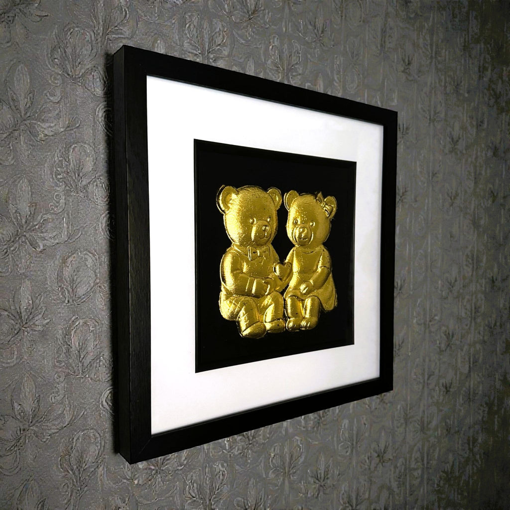 Framed teddy bear couple artwork displayed in a modern interior