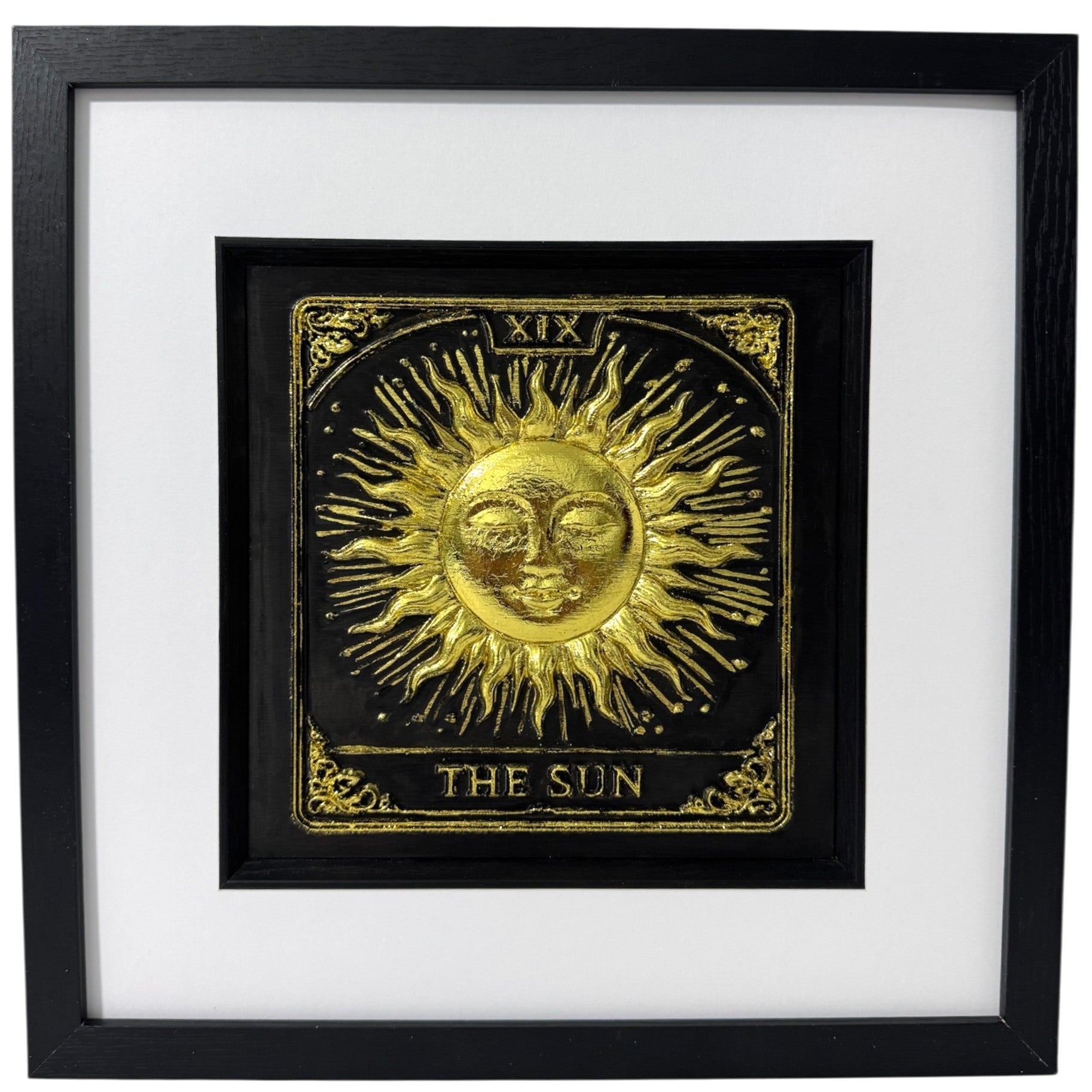 Direct front view of The Sun Tarot card in hand-applied gold leafing, focusing on the 3D sun rays and Major Arcana XIX detail.