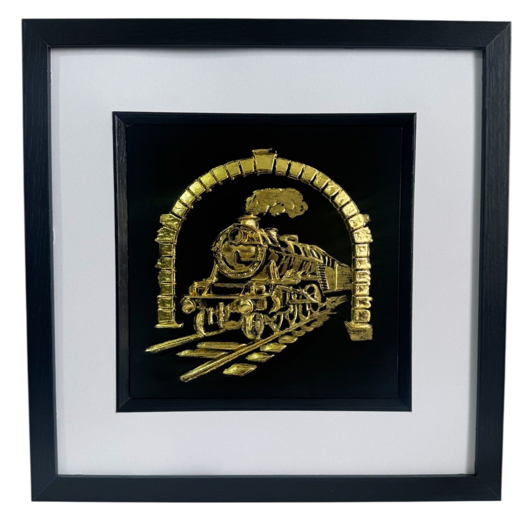Front view of steam locomotive 3D relief artwork in Gold Leaf on black background with white mount in a black box frame