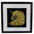 Framed unicorn wall art in gold leaf with raised relief unicorn head on a black background, black frame with white mount