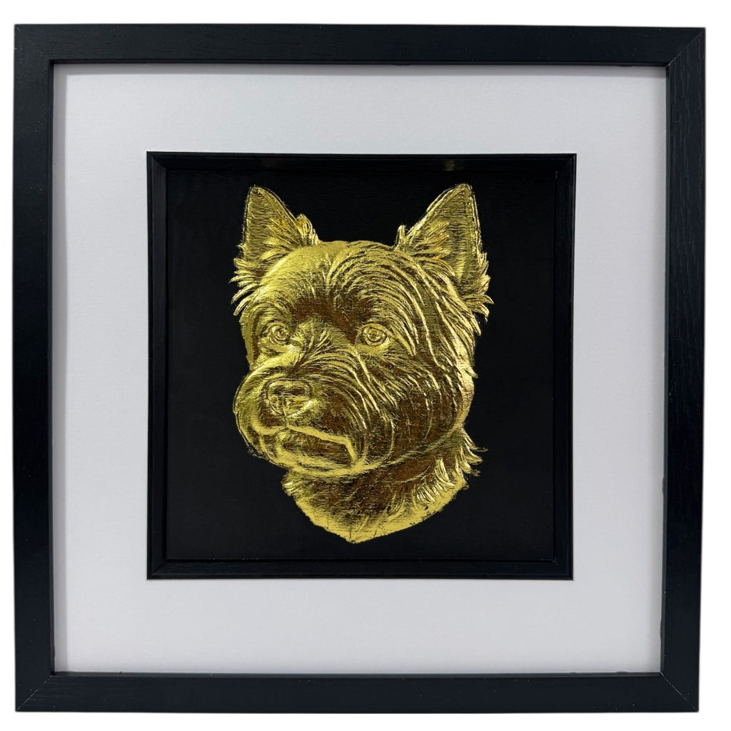 West Highland White Terrier framed wall art in gold leaf shown front on with black wooden frame white mount and black background