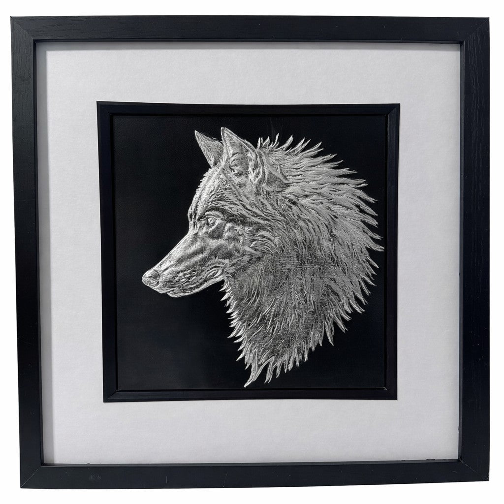 Silver wolf head wall art framed in black with white mount on black background